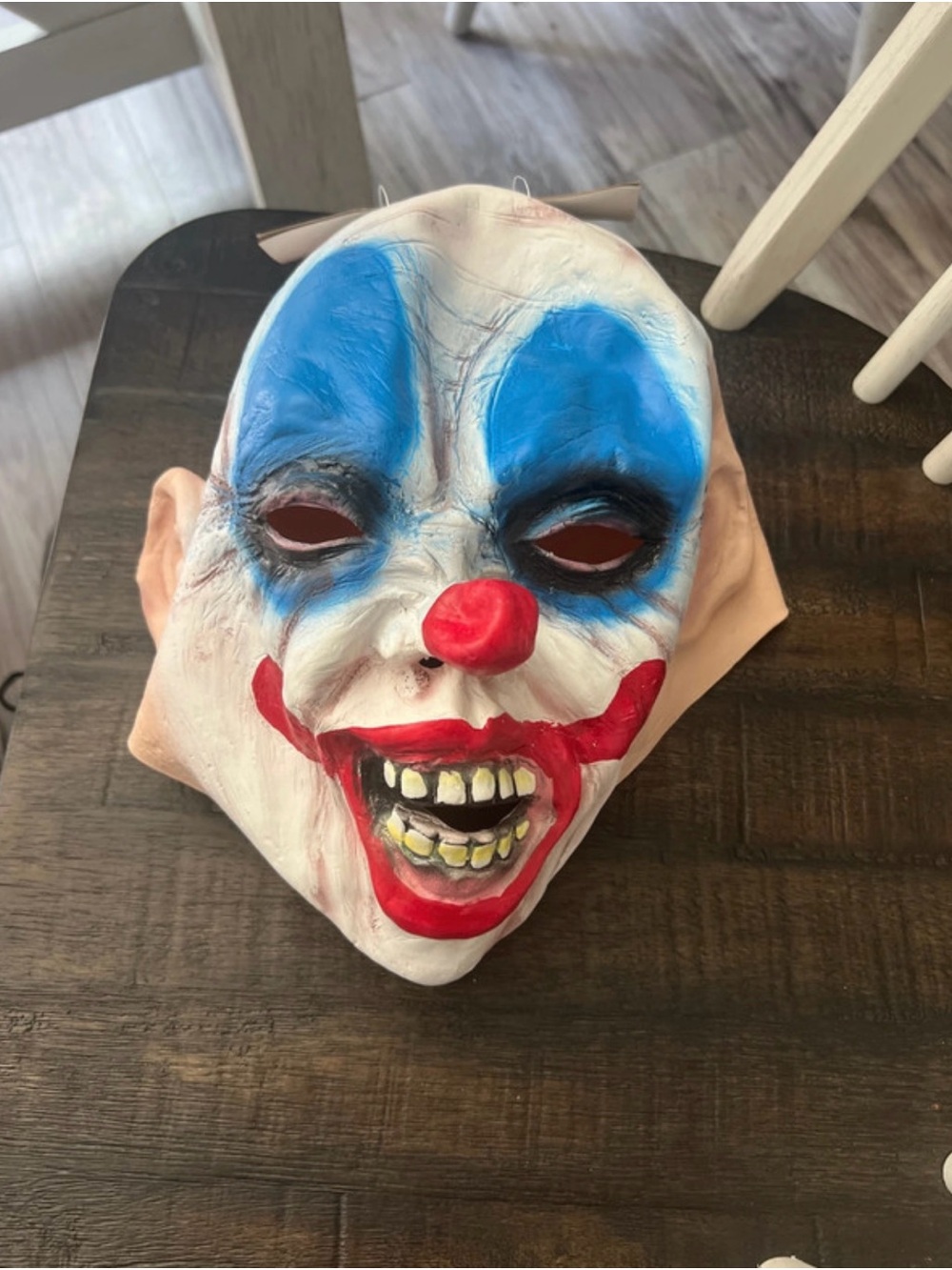 Scary Clown Mask with Blue Eyeshadow and Red Accents